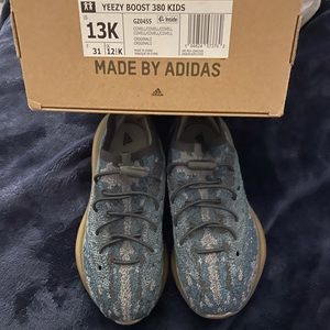 The latest Adiddas Yeezys. Only been worn once. No ware and tear at the bottom.